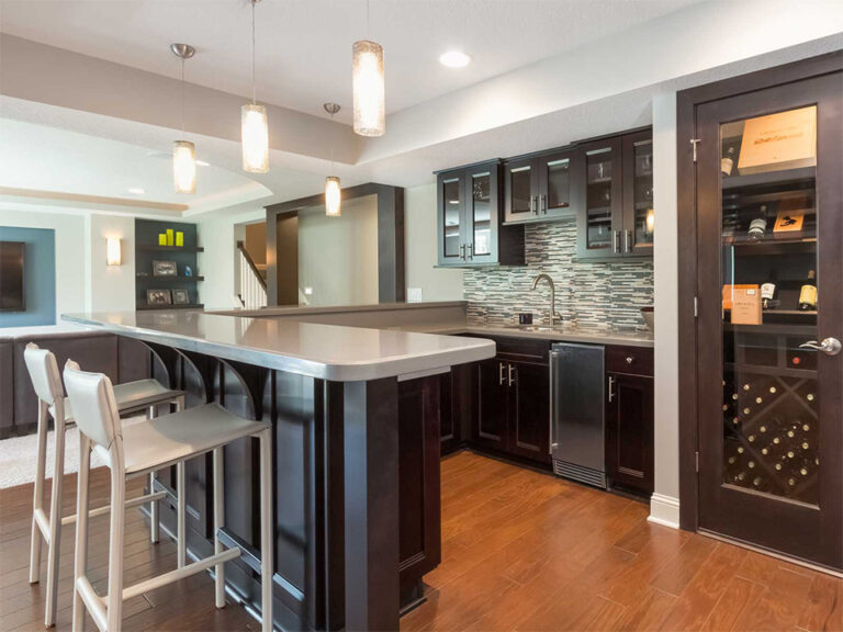 Wet bar and cabinetry in the finished basement