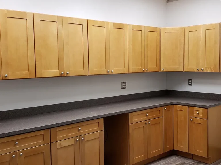 Commercial kitchen fit-out with stainless steel surfaces and cabinetry