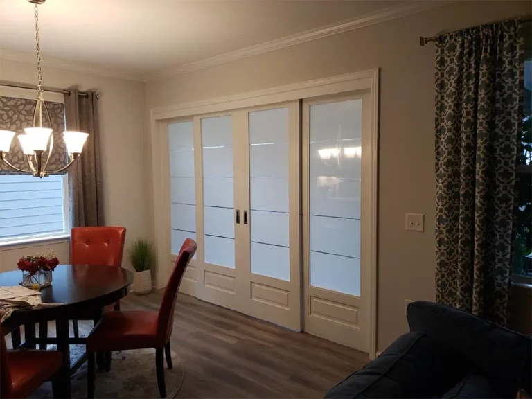 Frosted glass sliding doors fitted between two interior rooms