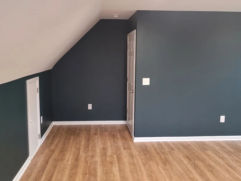 Custom wall panelling and trim detail in a remodeled Raleigh home