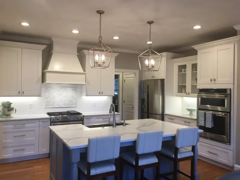 Completed kitchen remodel with an island and stone countertops