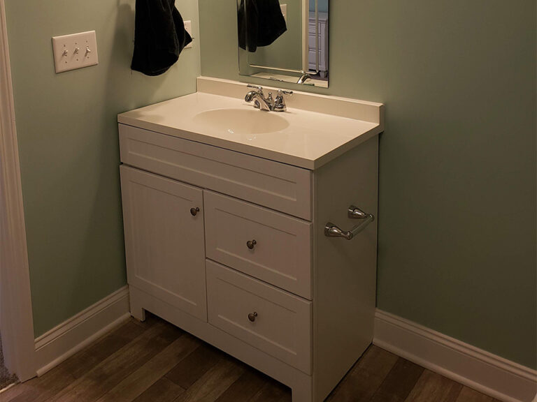 Finished Wake Forest basement with a family room, recessed lighting and painted trim